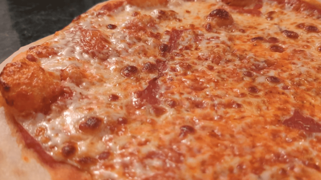 photo of a new york-style pizza